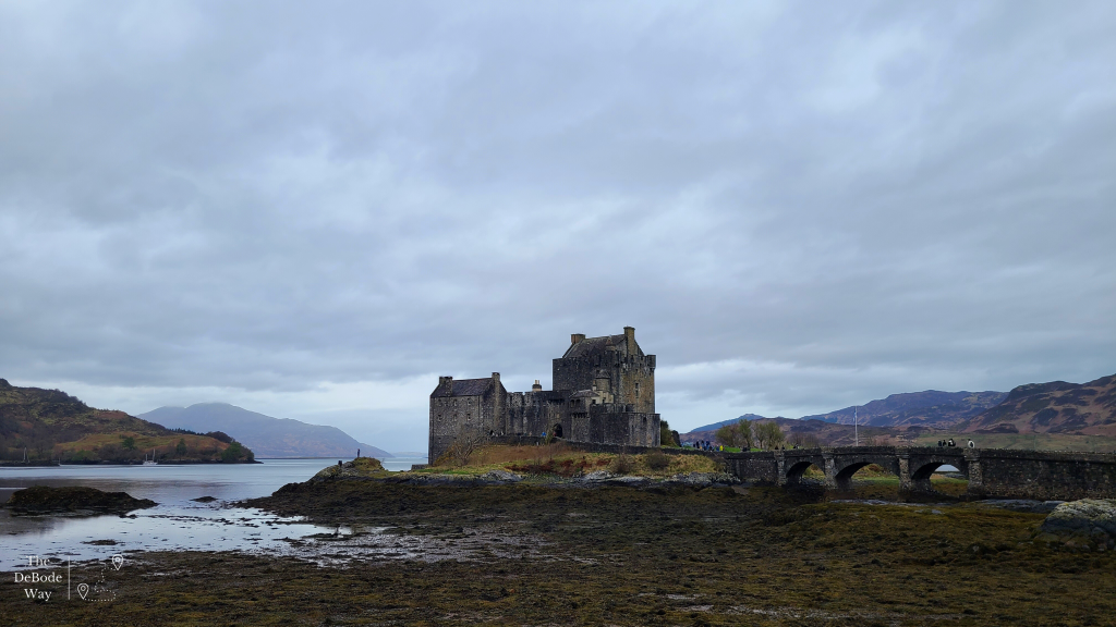 Dark shot of Eilean Donan Castle with the tide out