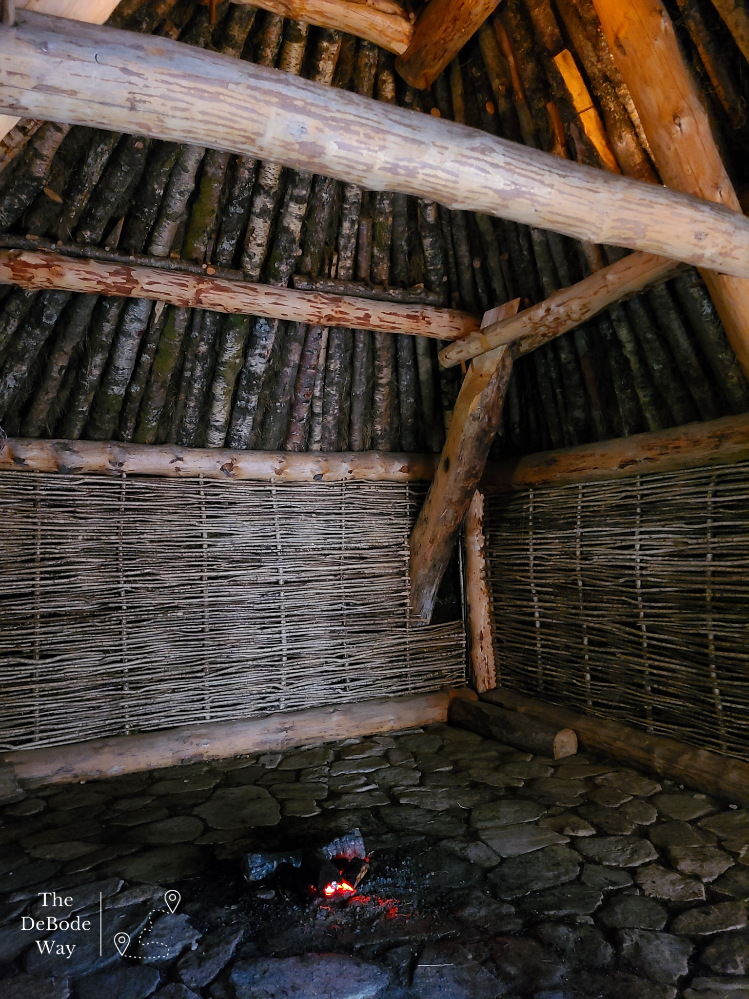 Fire instide the wood lined peat house