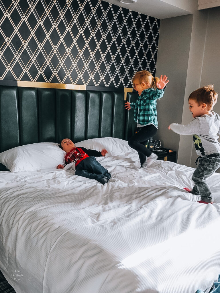 Kids on the bed - The Warrior Hotel Sioux City Iowa - Siouxland