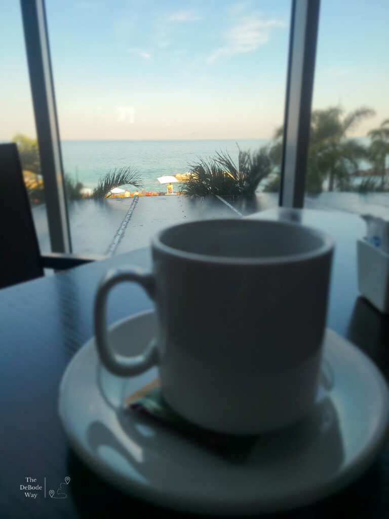 Morning coffee by the ocean
