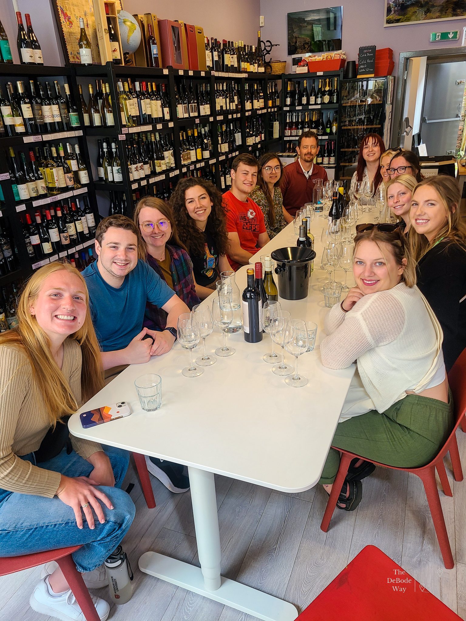 Group learning about wine pairings at the Wee Wine Shop
