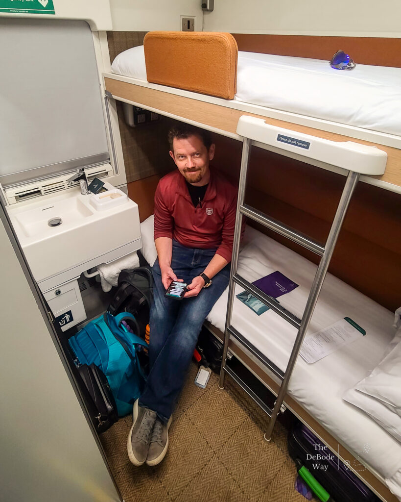 Jason in our Club Room on the Caledonian Sleeper Train