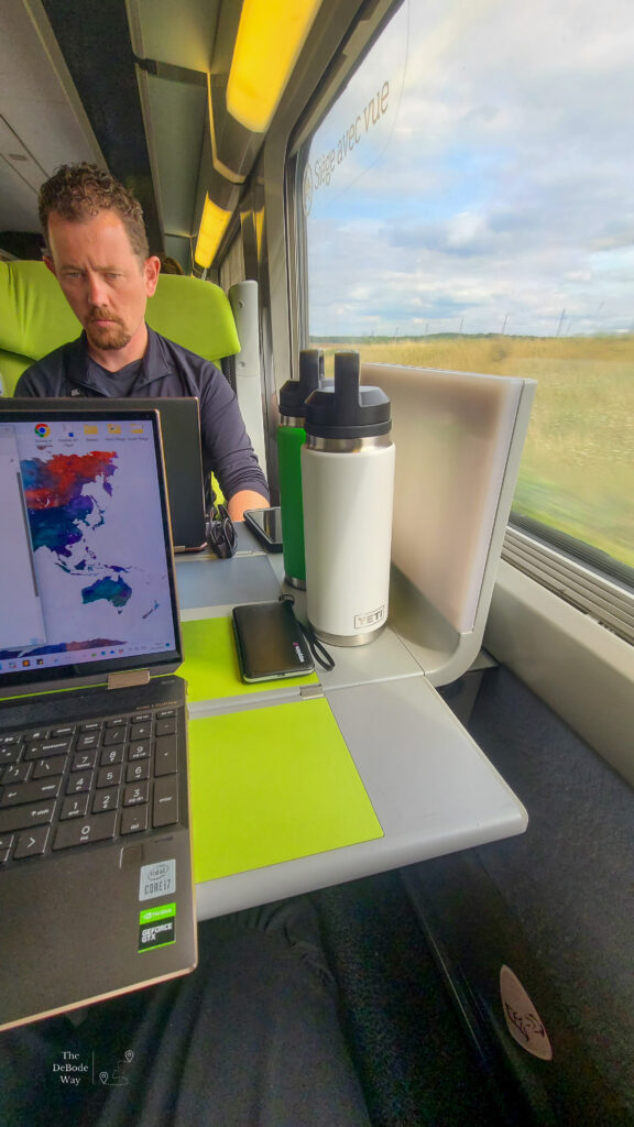 working on computers while riding the train