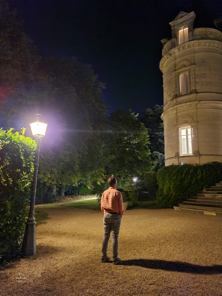Jason in the dark with a lamp post at Hotel Domaine de la Tortiniere