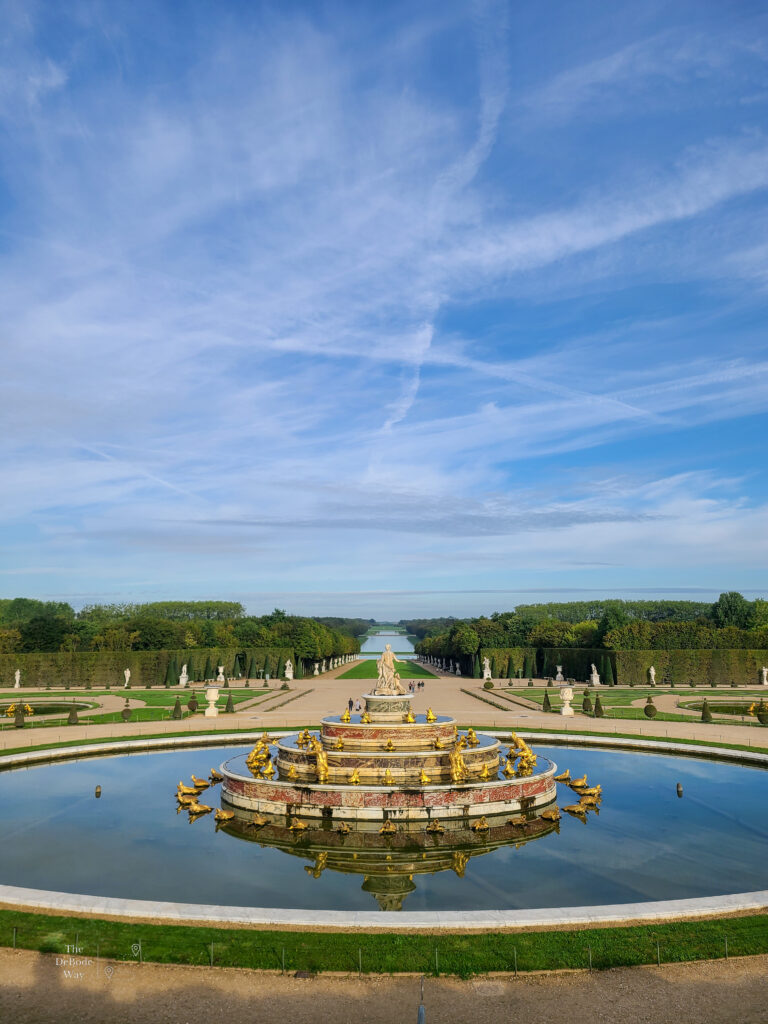 Overlooking a fountain with the Grand Canal beyond at Palace of Versailles