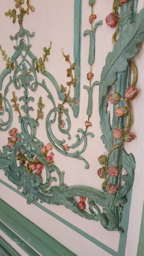 Painted details on wooden shutters at the Palace of Versailles
