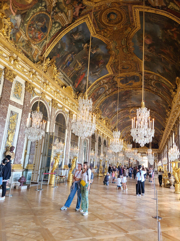 Visitors in the Hall of Mirrors at the Palace of Versailles