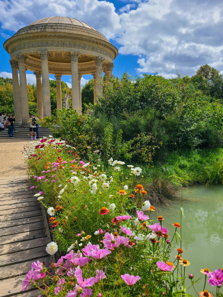 Bridge, flowers, water, gazebo in the gardens at the Petite Trianon