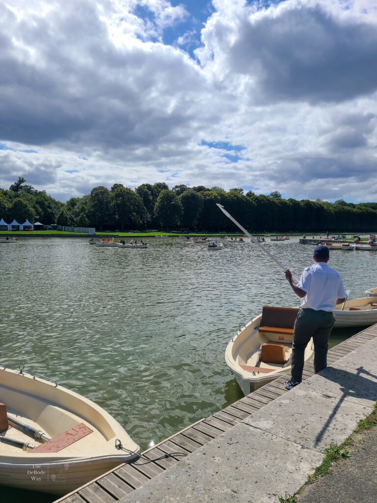 Boats on the water of the Grand Canal at the Palace of Versailles