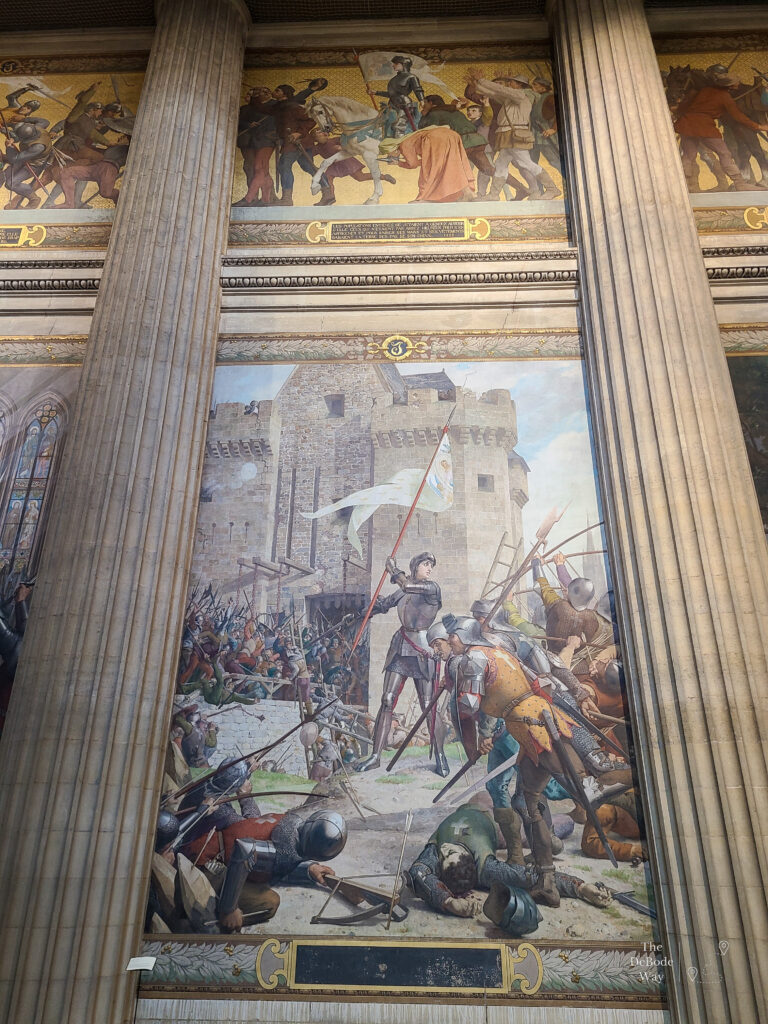 A painting of Joan of Arc waving a flag in the Pantheon