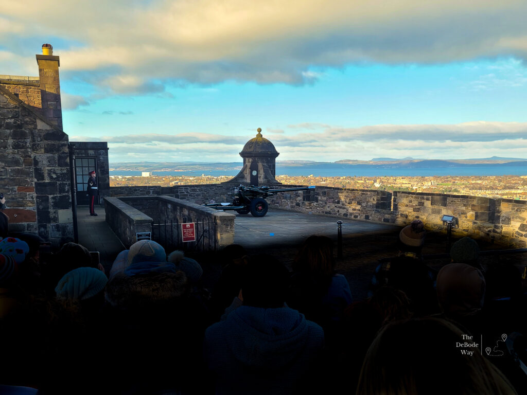 A soldier waiting to fire the 1 o'clock gun from a terrace at Edinburgh Castle