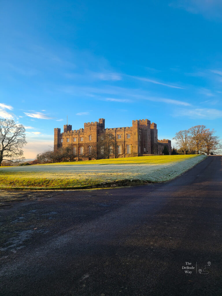 Scone Palace on a frosty hill of green grass
