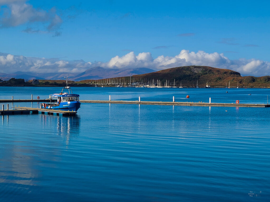 View of Oban Bay with boats on a sunny day in October
