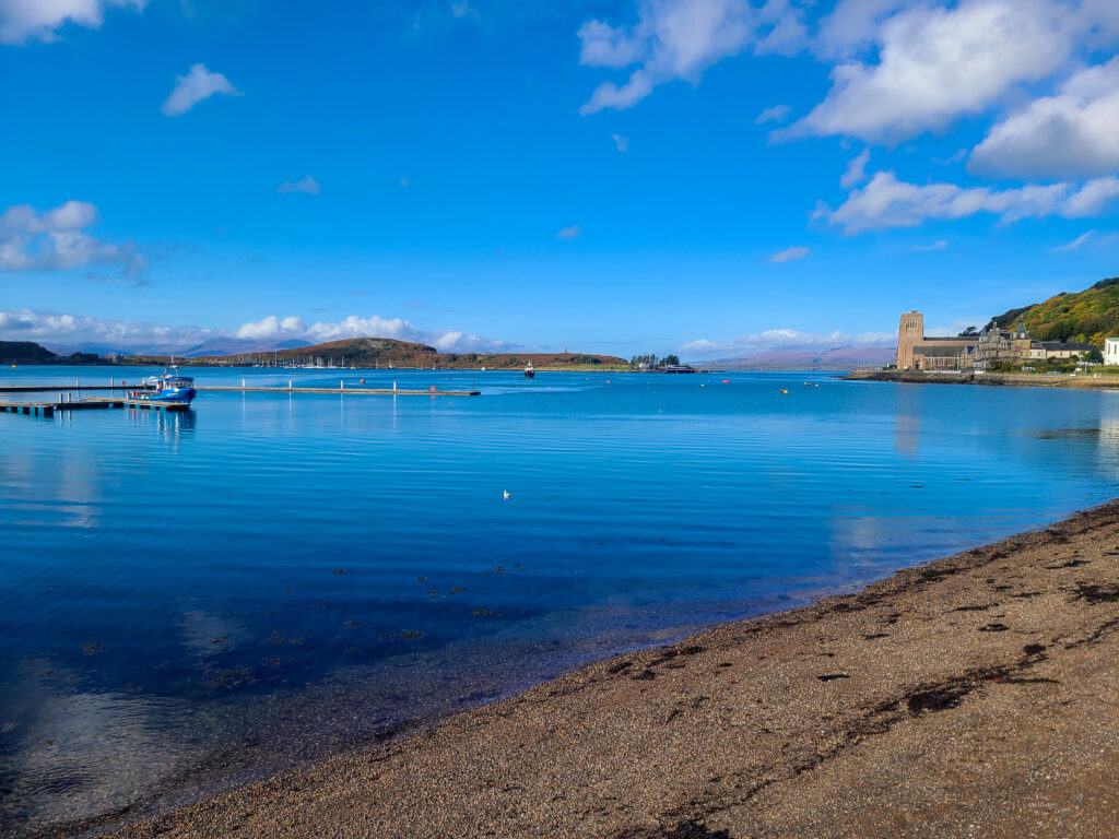 Very blue sky and water of Oban Bay from the beach