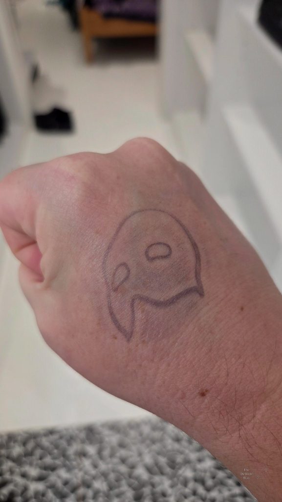 Phantom mask stamp on my hand as our entrance pass