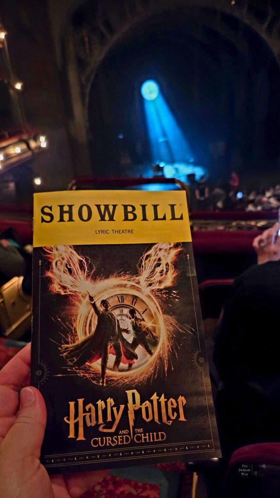 Showbill for Harry Potter and the Cursed Child with Lyric Theatre stage in the background in New York City
