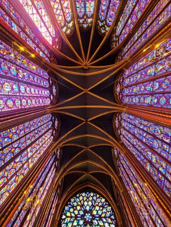 Sainte Chapelle dark starry night sky ceiling and rainbow of stained glass windows