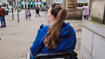 Tasha on a mobility scooter for disabled travel in Edinburgh